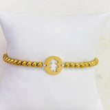 Pulsera  bolitas niña S/Steel Dorado